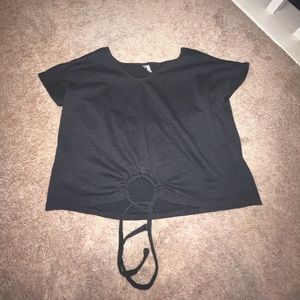 Black top, with tie on the bottom